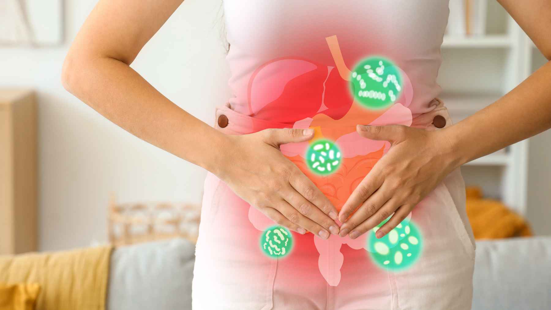 A colorful assortment of prebiotic fruits rich in fiber, including apples, bananas, berries, pears, grapefruit, and avocado, displayed for gut health.