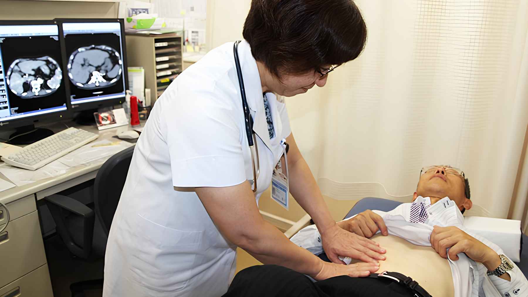 Healthcare professional performing a noninvasive liver examination to detect liver fibrosis before symptoms develop.