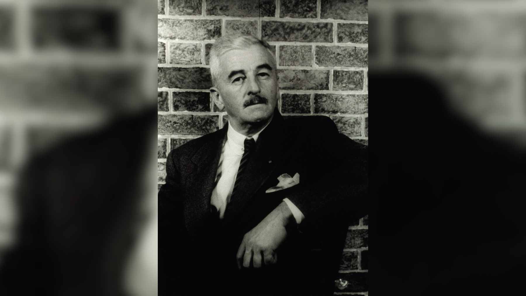 A vintage photograph of Nobel Prize-winning author William Faulkner, known for his complex and honest exploration of human relationships.