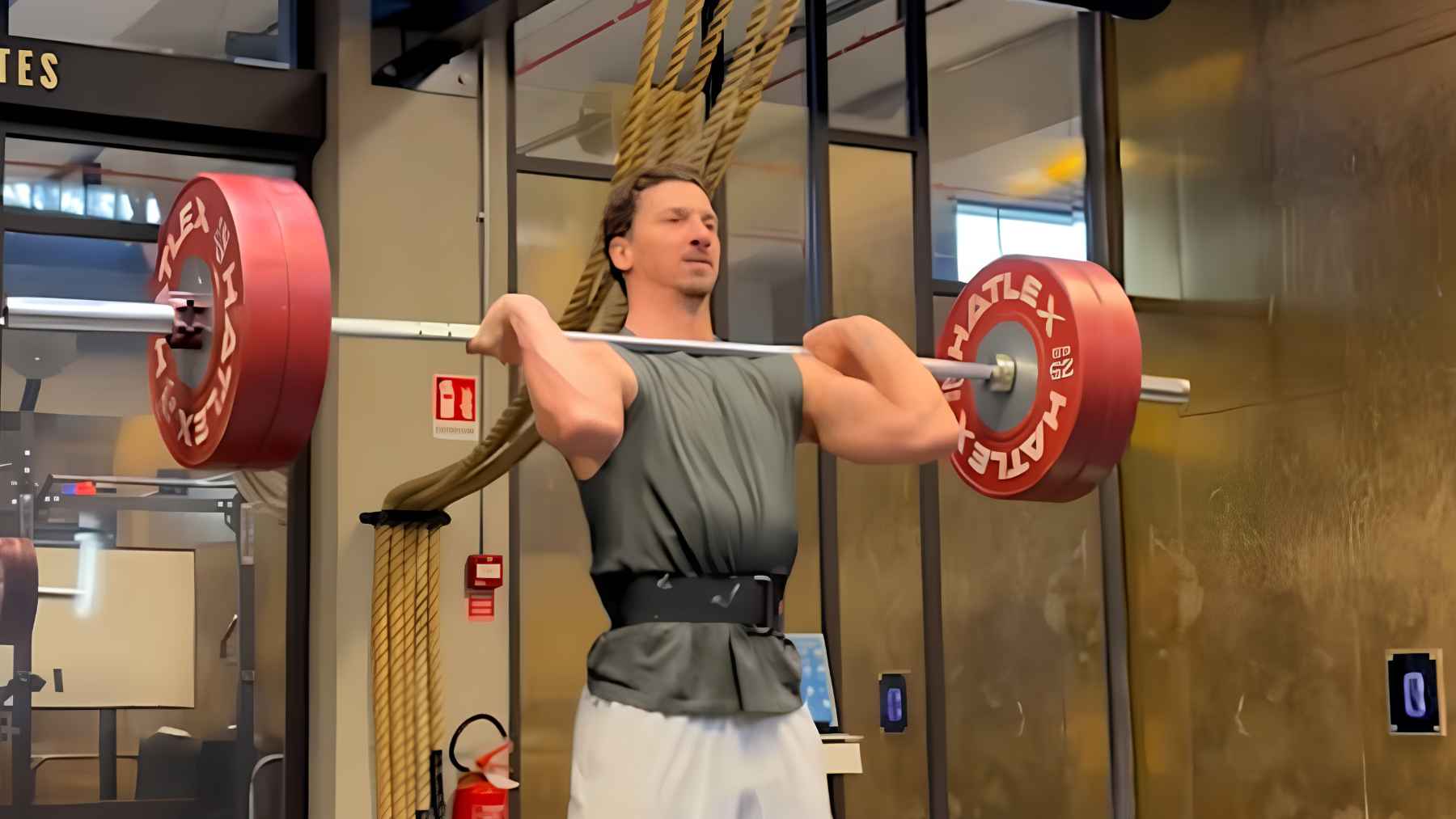 Zlatan Ibrahimović performs a heavy barbell lift during a CrossFit training session, demonstrating the intense workouts he follows after retirement.