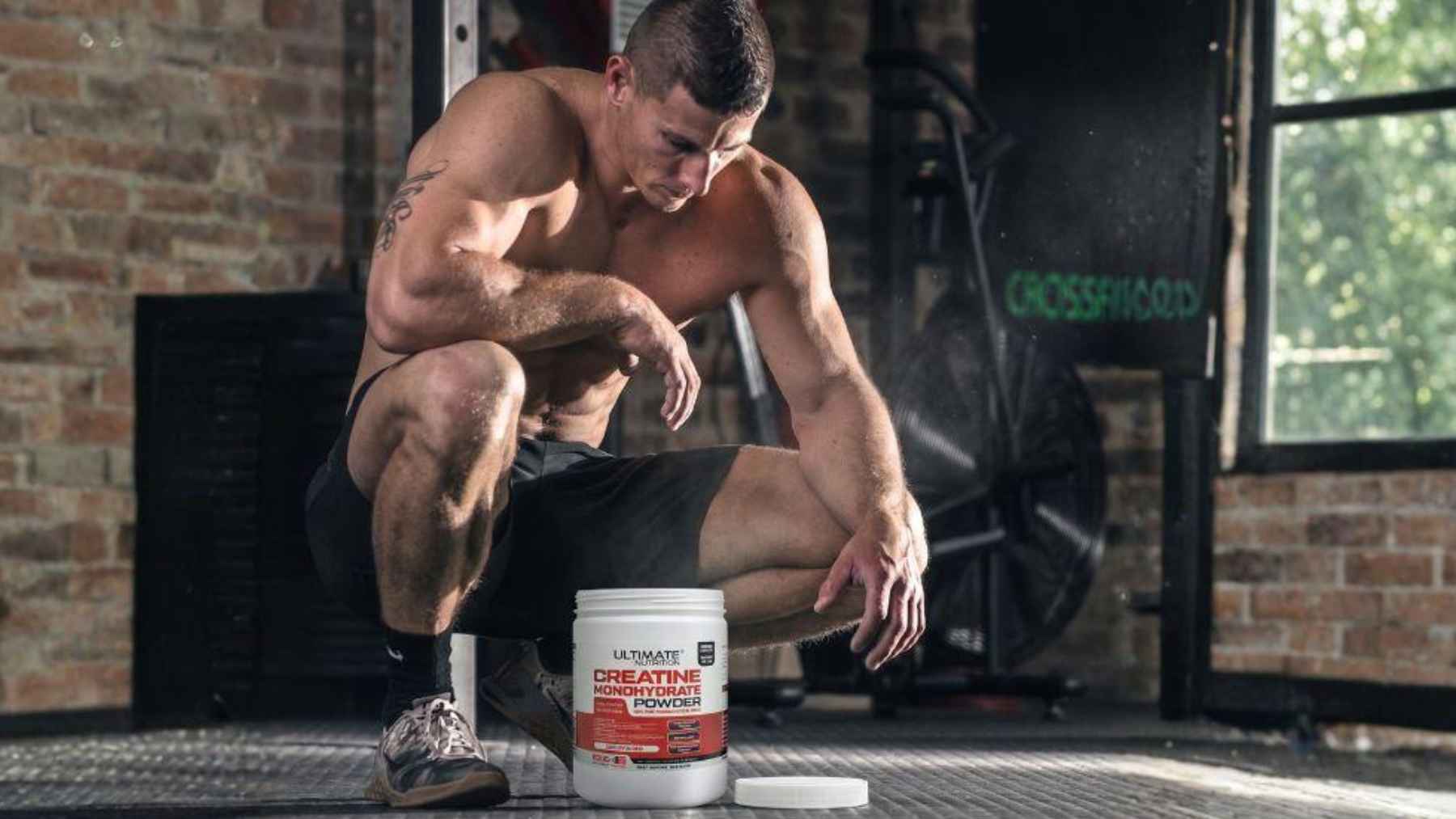 Creatine supplement powder in a supermarket wellness and sports nutrition section