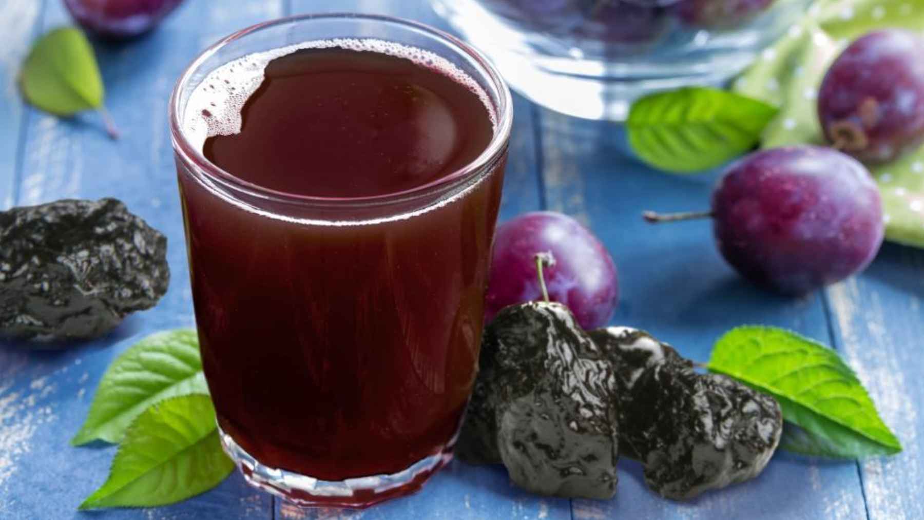 Fresh fruits, vegetables, whole grains, and other fiber-rich foods displayed at a market to support healthy digestion and regular bowel function.