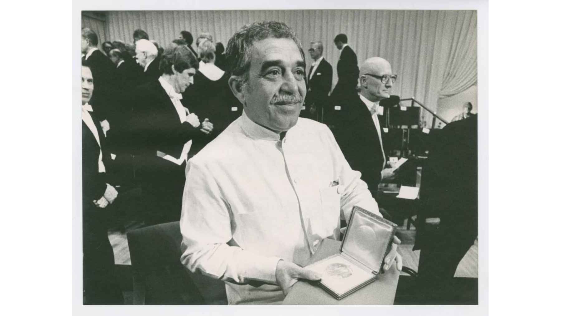 Gabriel García Márquez holds his Nobel Prize medal during the Nobel Prize ceremony after receiving the 1982 Nobel Prize in Literature.