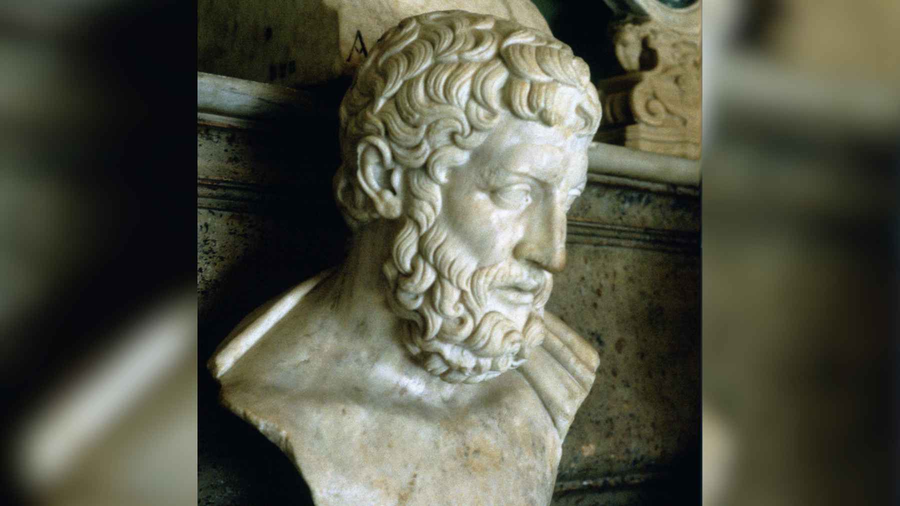 An ancient Greek sculpture representing classical philosophy, wisdom, and reflections on health, contrast, and human desire.