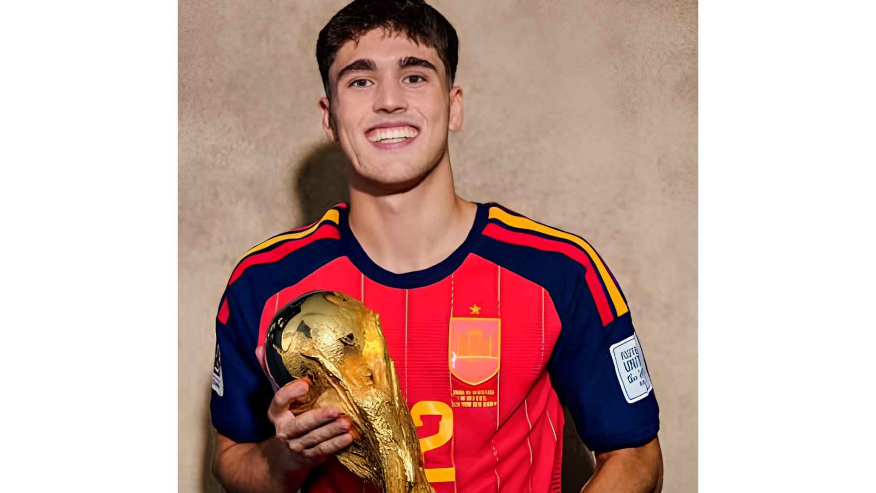 Pau Cubarsí holding the World Cup trophy while wearing Spain’s jersey after the 2026 World Cup final
