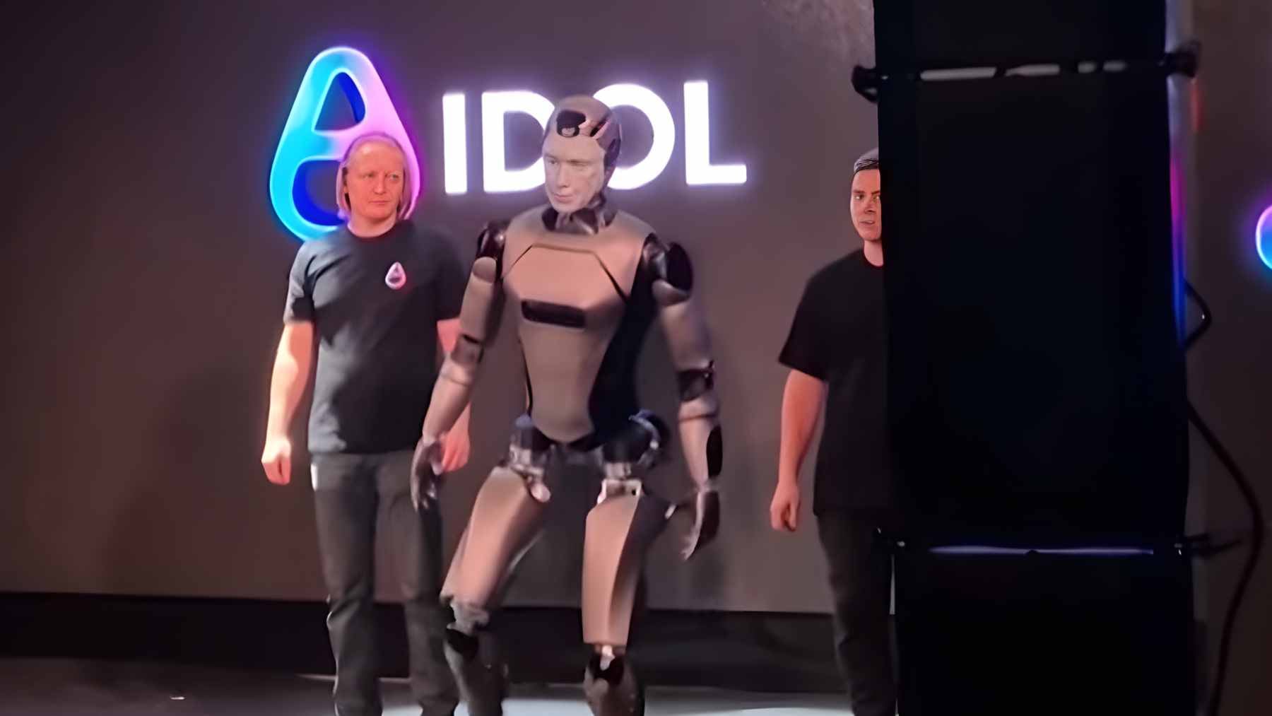 The Russian humanoid robot AIdol falling face-first on a stage at the Yarovit Hall Congress Center in Moscow during a live demonstration.