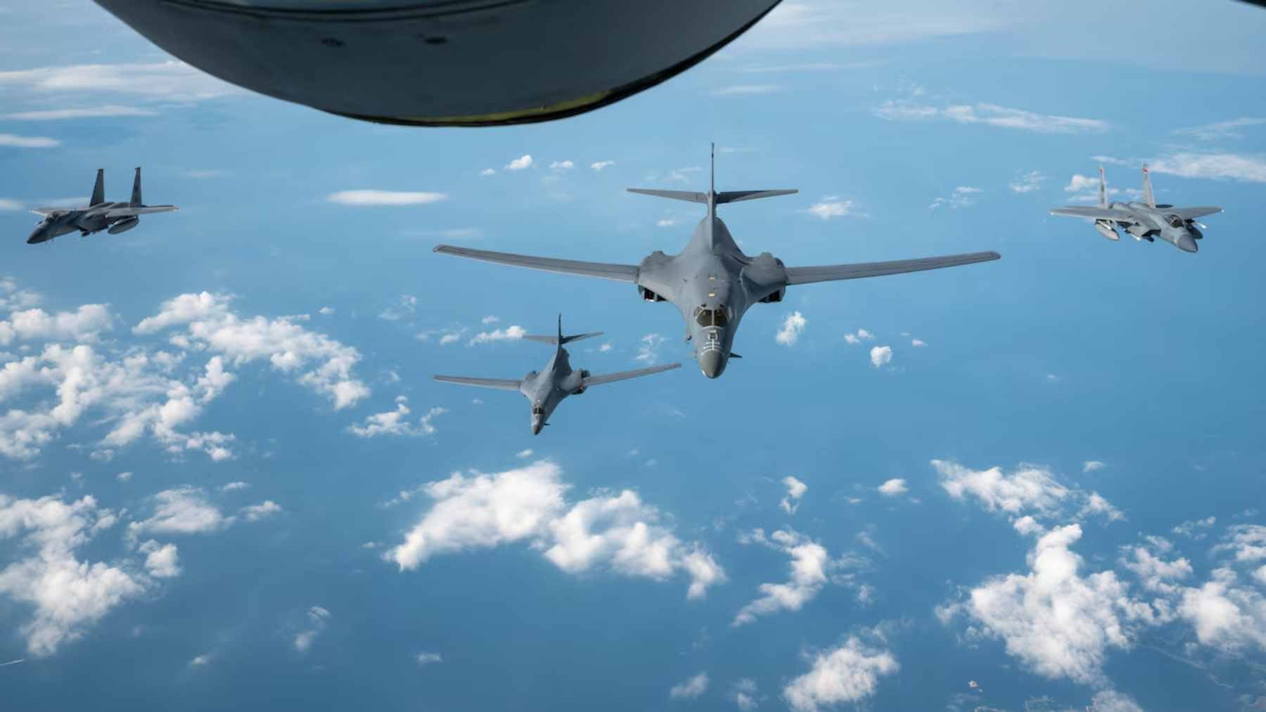 A US Air Force B-1B Lancer bomber landing at RAF Fairford after a long-range mission, showcasing its variable-sweep wing design.