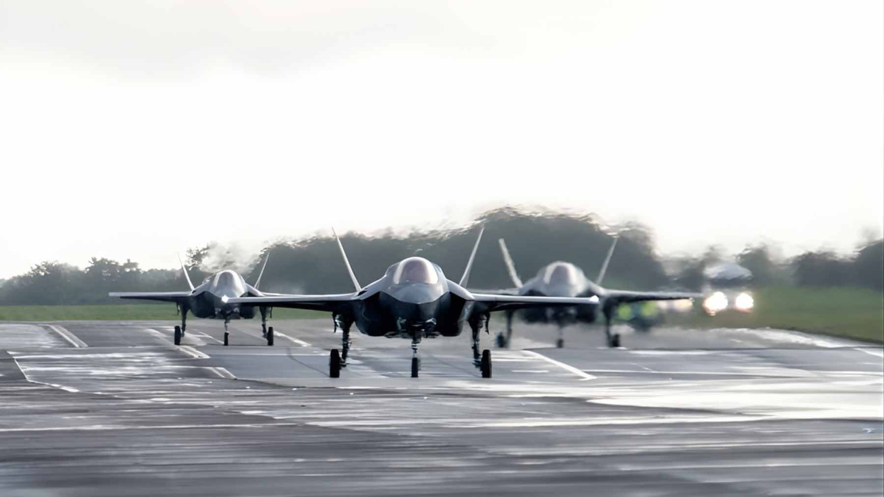 A British Royal Air Force F-35B Lightning II stealth fighter jet engaged in a combat patrol mission.