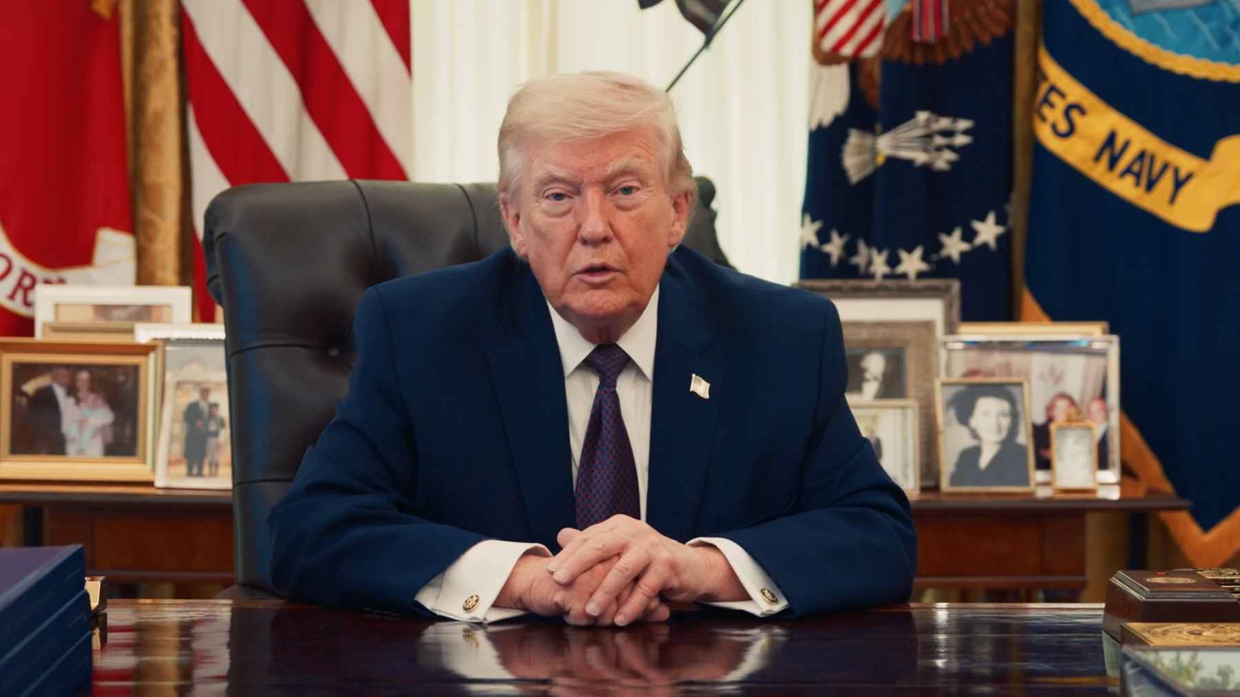 A CTA Red Line train pulling into a station in Chicago, representing the transit projects currently facing a federal funding dispute.