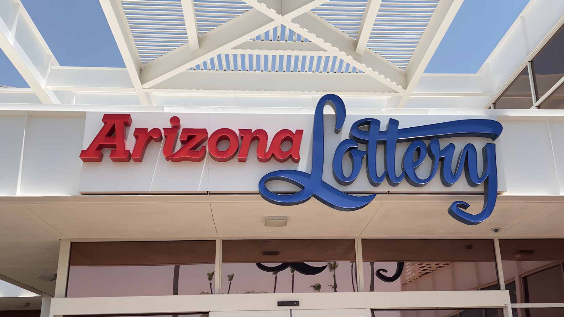 A winning Arizona Lottery ticket lying on a Circle K convenience store checkout counter next to a cash register.