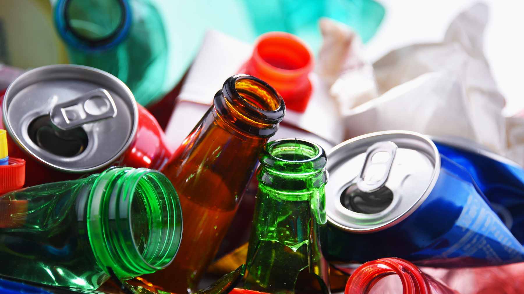 A mountain of aluminum cans and plastic bottles at a Connecticut redemption center awaiting processing under the new 10-cent deposit law.
