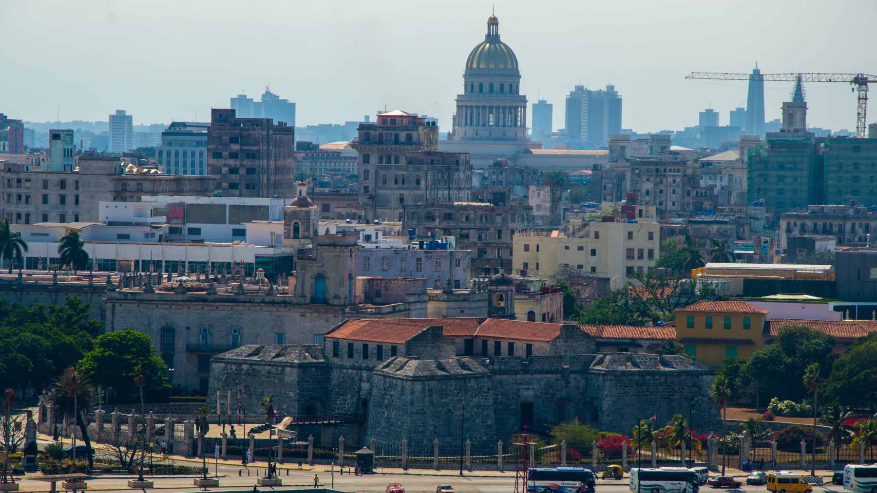 A newly installed solar photovoltaic park in Cuba, featuring rows of panels providing decentralized energy to local municipalities.