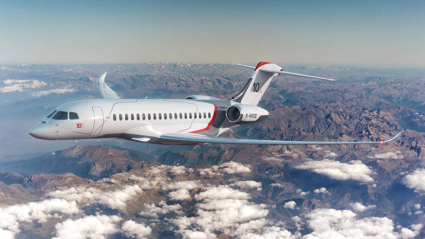 The Dassault Falcon 10X private jet in flight, showcasing its new aerodynamic design and Rolls-Royce Pearl 10X engines.