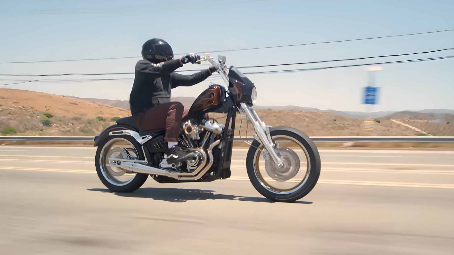 A classic Harley-Davidson motorcycle in an Indian showroom, representing the new zero-duty import status.