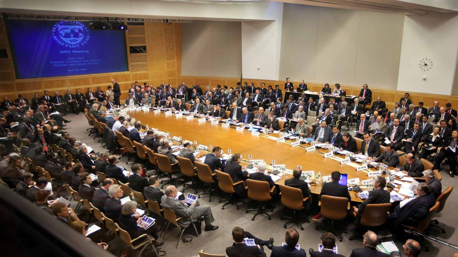 IMF spokesperson Julie Kozack addressing the press regarding the impact of rising oil prices and the Strait of Hormuz closure on global inflation.