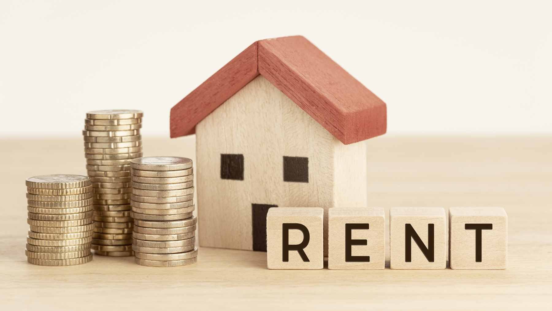 An interior view of a modular housing factory, similar to the Prime Craftsman Homes facility in Wichita, showing homes under construction.