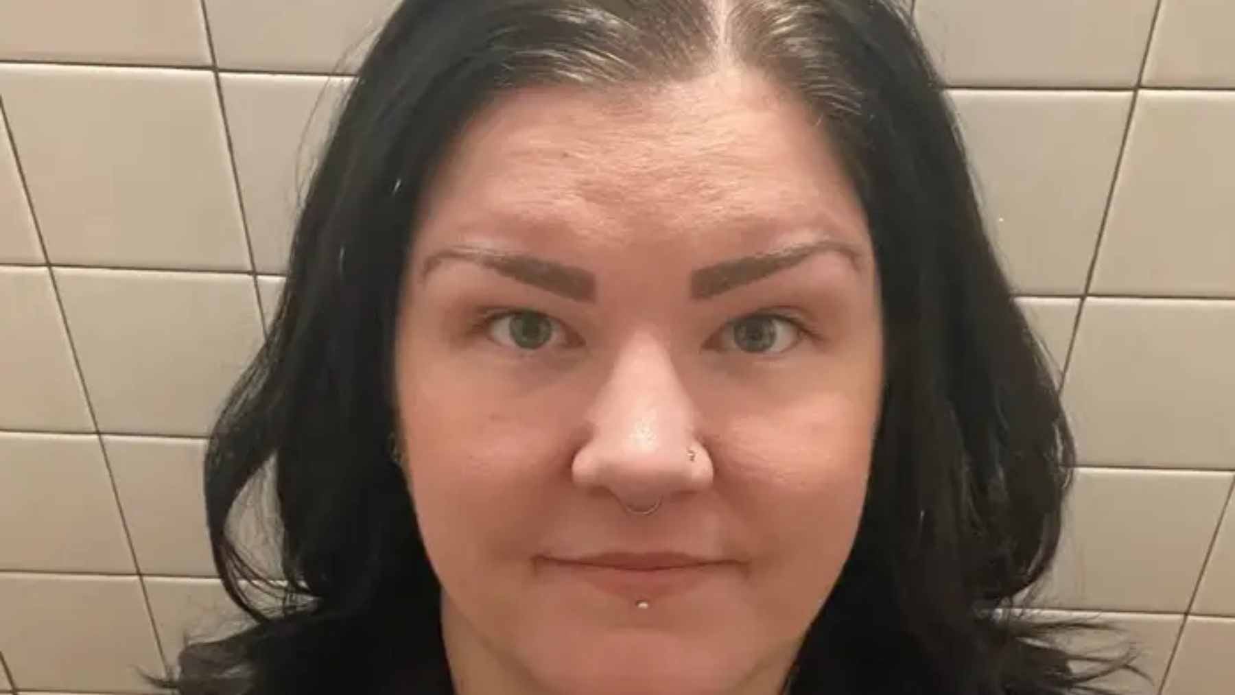 A portrait of Valerie Lockhart, a former Morgan Stanley professional, highlighting the personal toll of long-term unemployment and the rising cost of living.