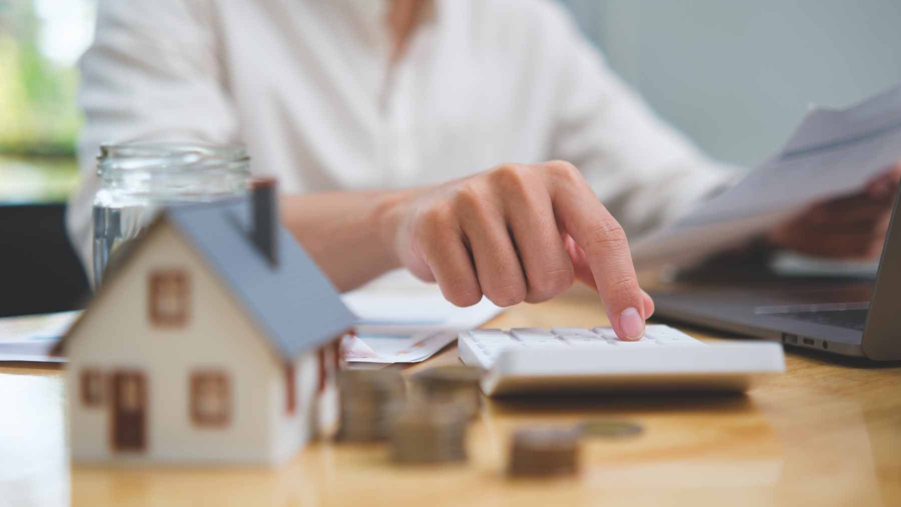 A New York homeowner reviewing property tax documents and a Department of Veterans Affairs disability rating letter.