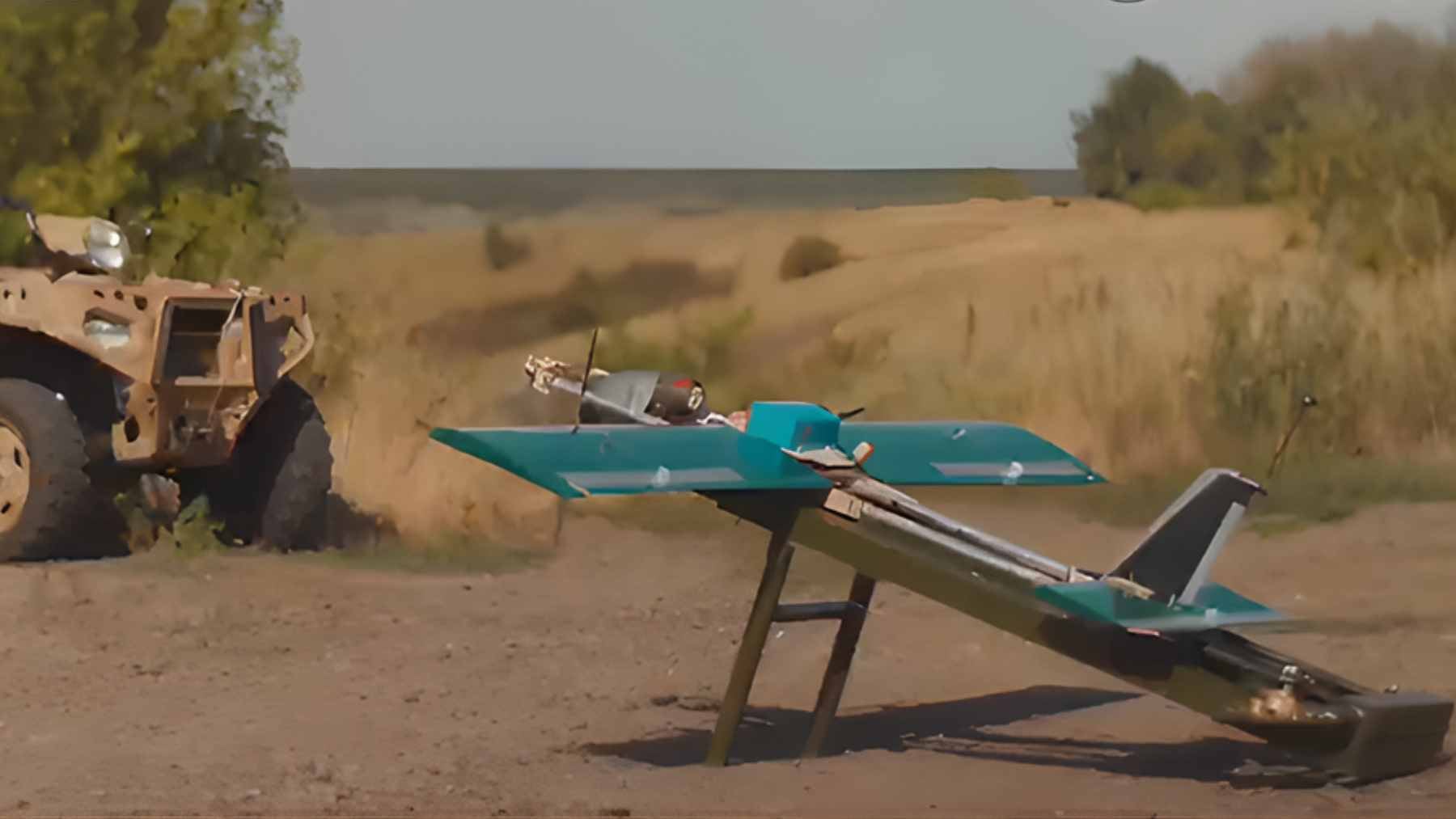 A Russian Molniya drone featuring a plywood and foam airframe, modified with high-definition cameras and additional battery packs for long-range reconnaissance.