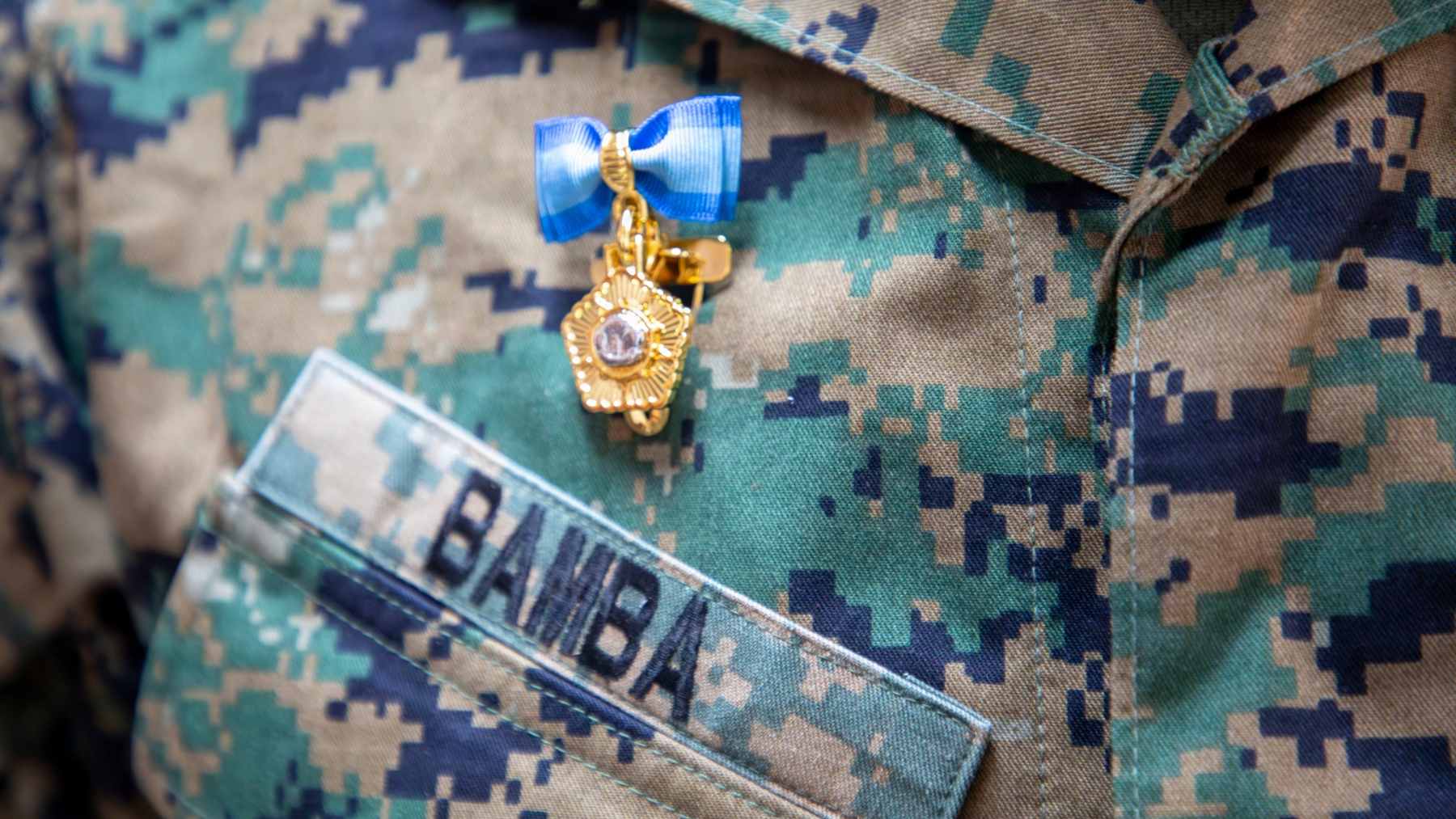 U.S. Marine Corps Sgt. Maj. Ismael G. Bamba standing at attention during the Prime Minister’s Commendation ceremony in South Korea.