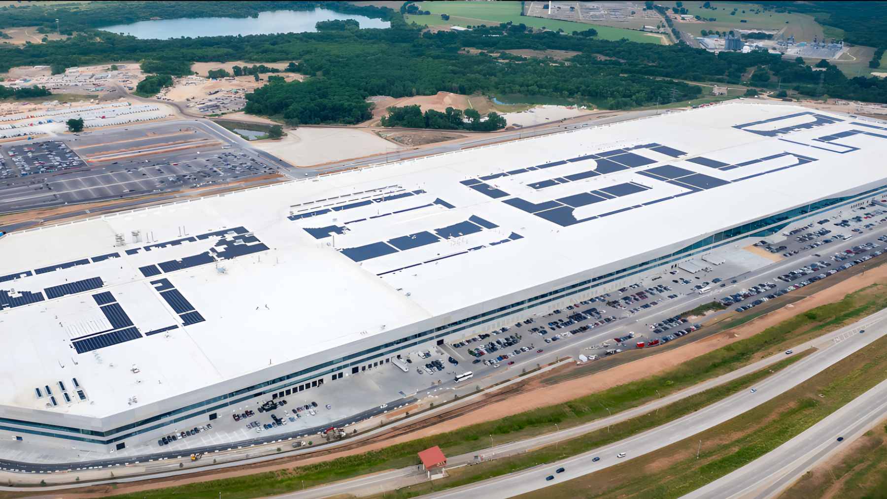 A high-tech automated assembly line for photovoltaic solar cells, representing the manufacturing equipment Tesla is sourcing from China.