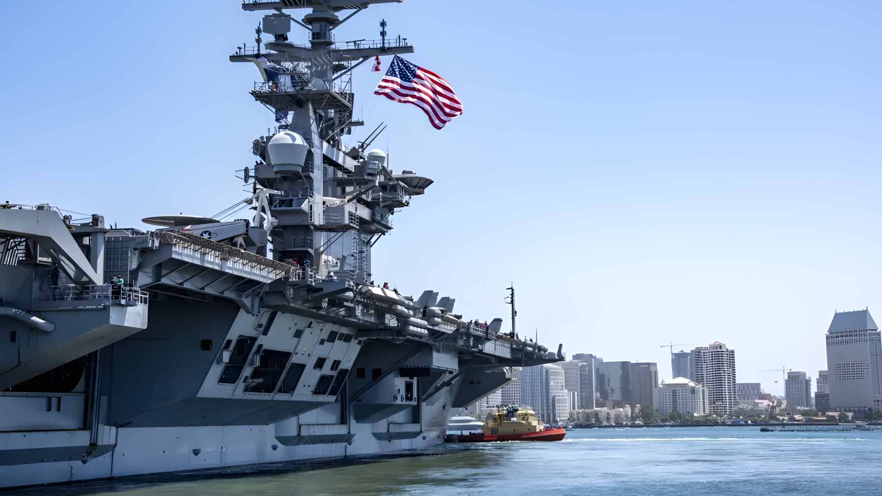 A U.S. Navy aircraft carrier sailing in the open ocean, representing the USS Nimitz's deployment to the South Atlantic.