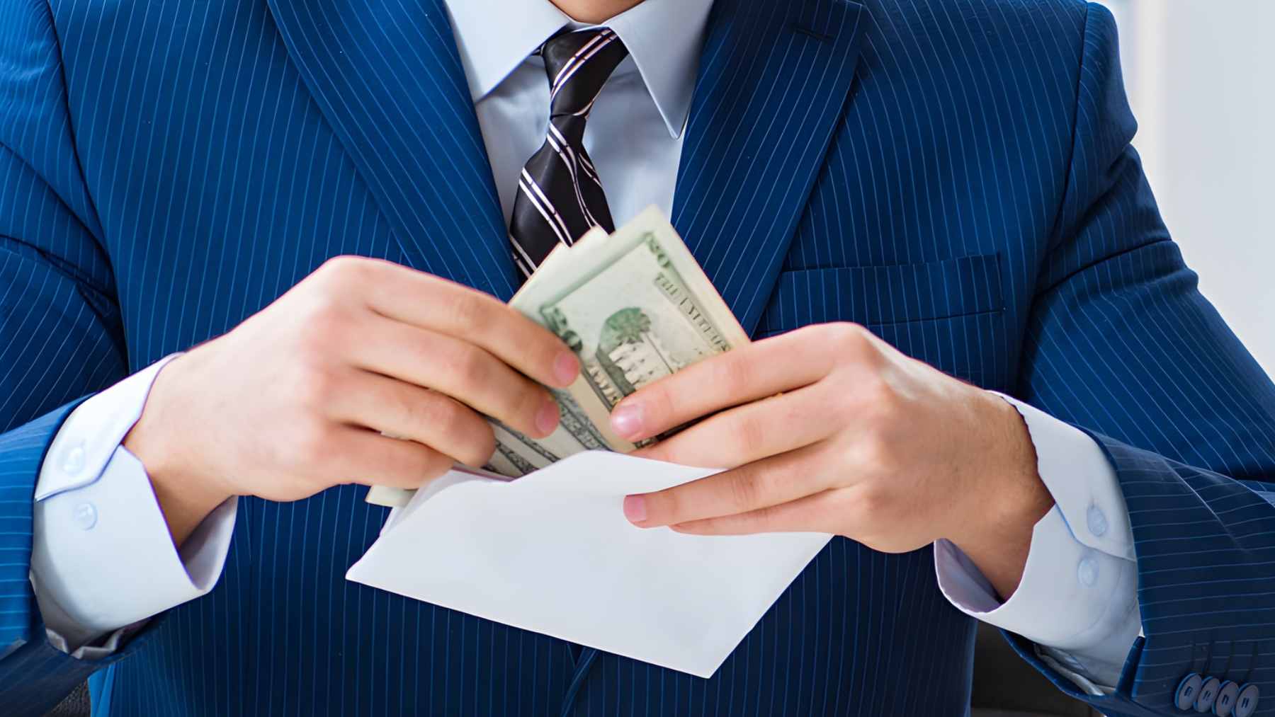 A frustrated manager reviewing a corporate HR policy document in a modern office setting, representing the pitfalls of poorly drafted workplace incentives.