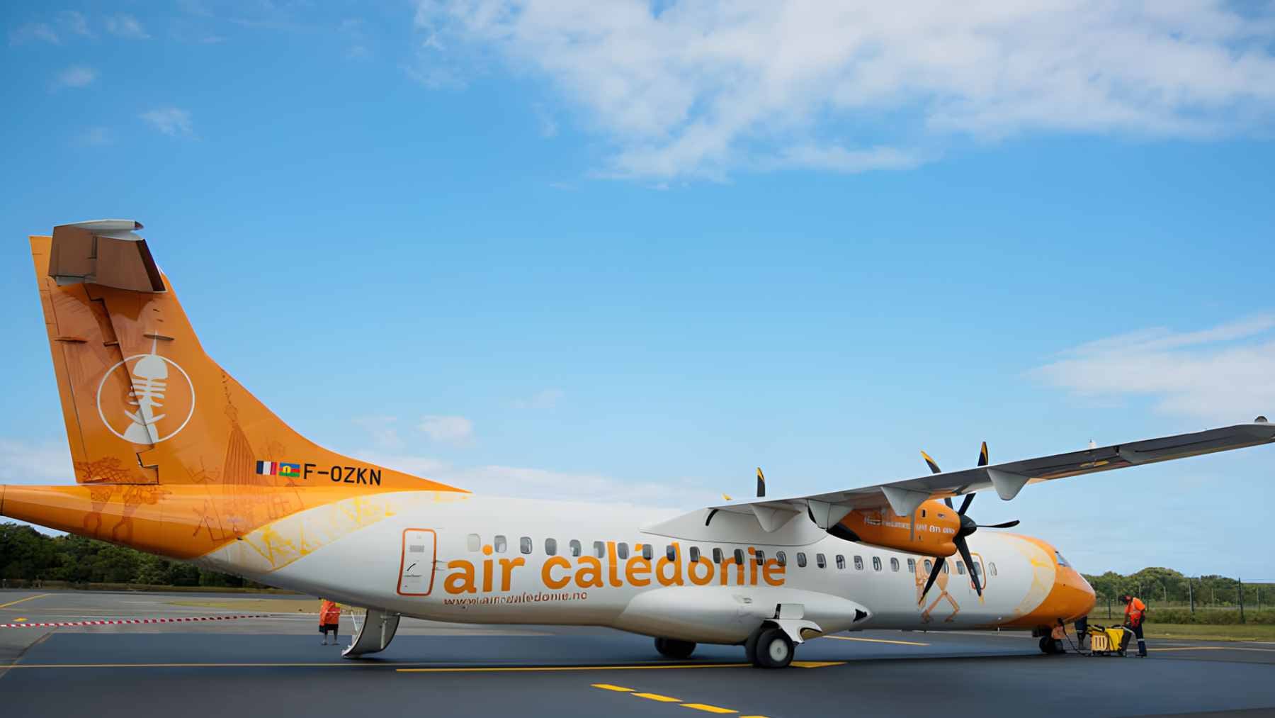An Air Calédonie ATR 72-600 turboprop passenger plane parked on a regional runway in New Caledonia.