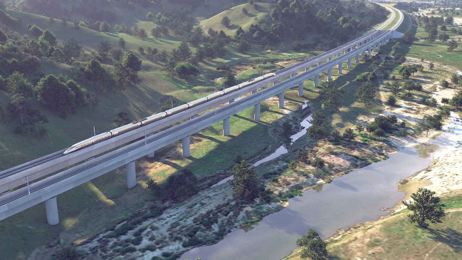 California high-speed train rendering crossing a long viaduct, illustrating the project’s move toward track and systems installation