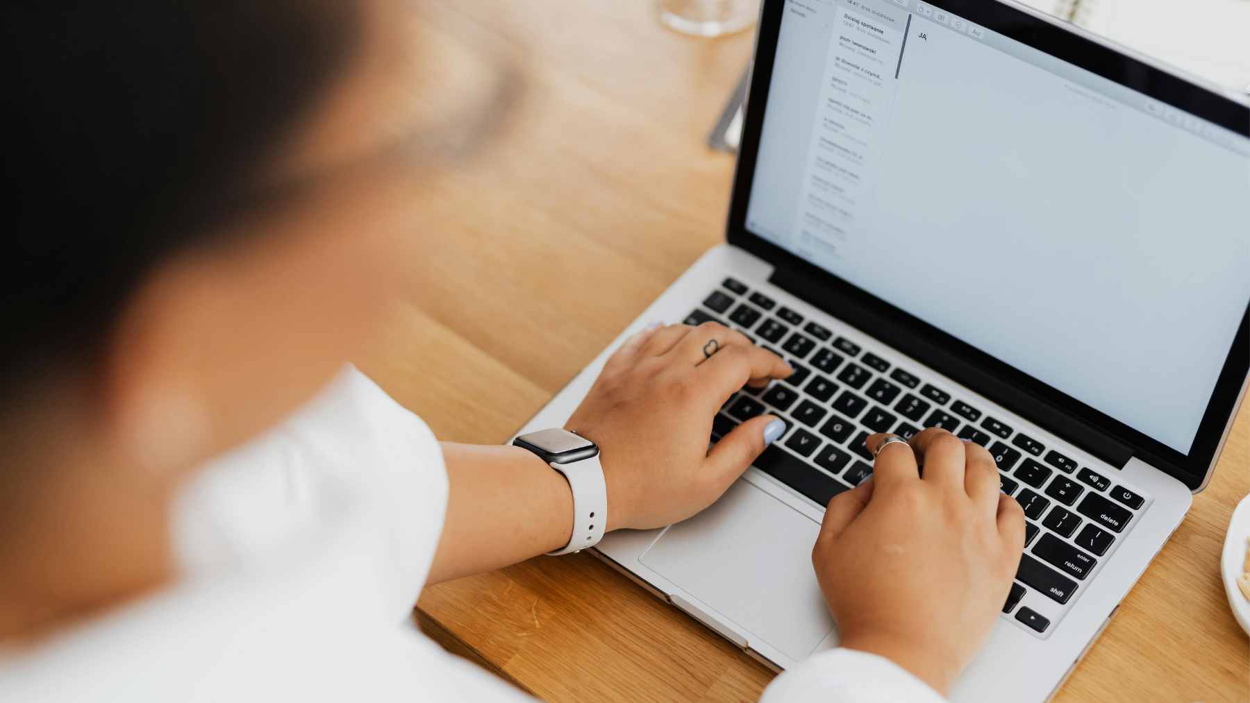 A smartphone screen displaying the Google Account settings menu with a highlighted button to change the user's Gmail address.