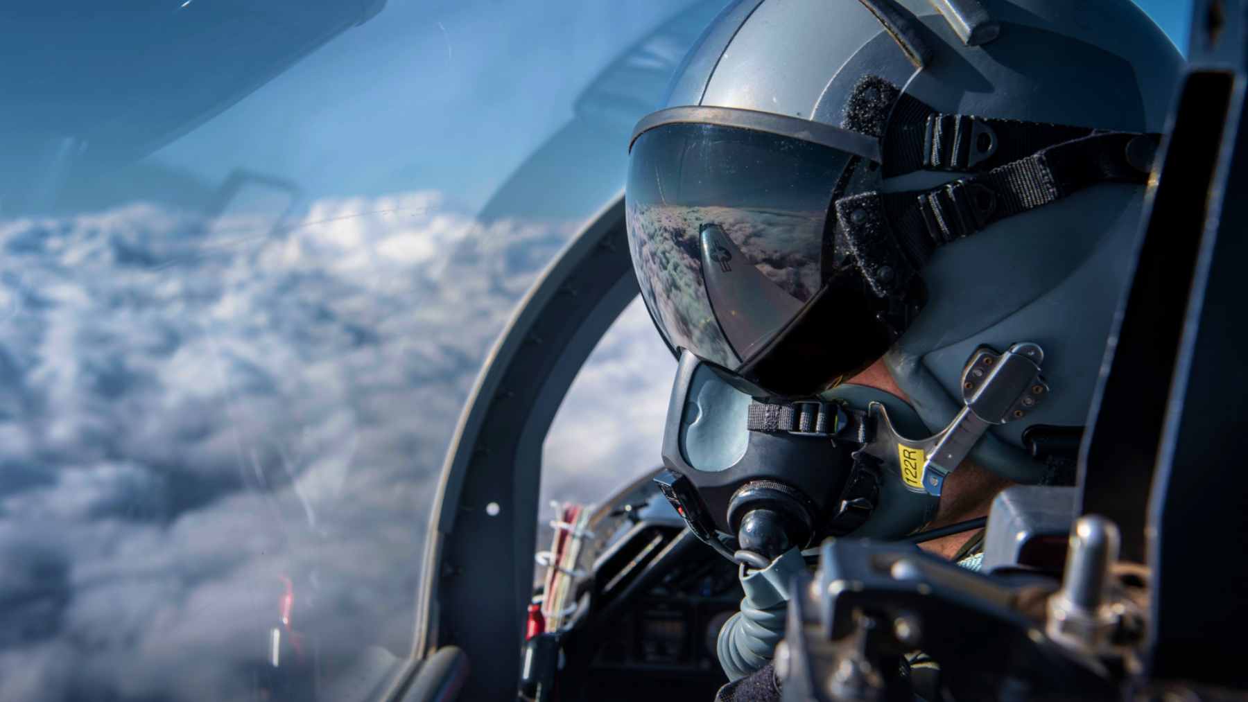 An abstract visual representation showing glowing blue magnetic wave fields overlapping with a digital heartbeat line.