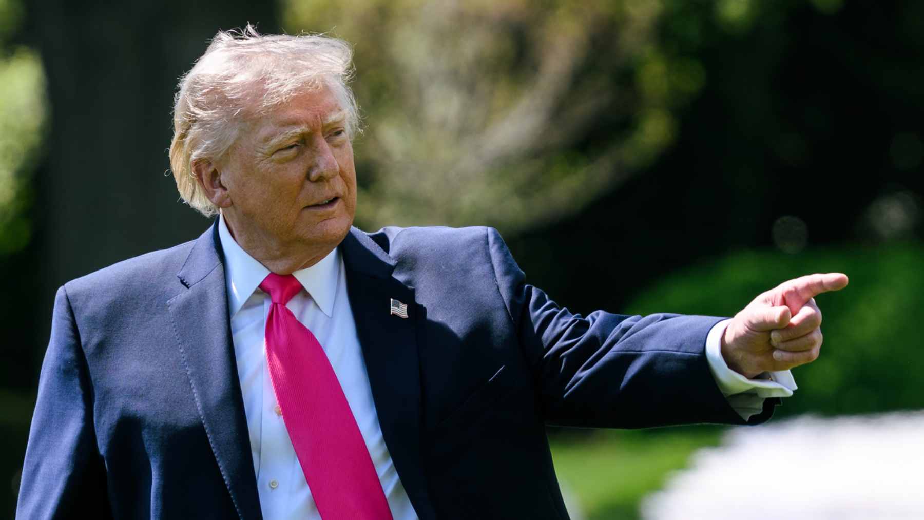 The historic, gray granite facade of the Eisenhower Executive Office Building situated next to the White House.