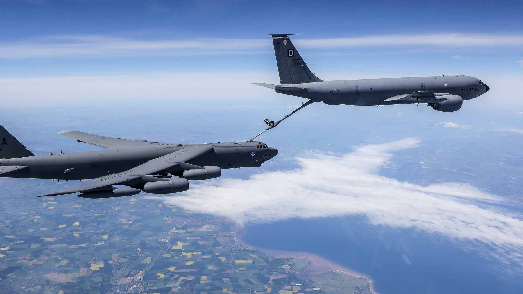 A U.S. Air Force B-52 bomber soaring through the sky on a long-range overland mission.