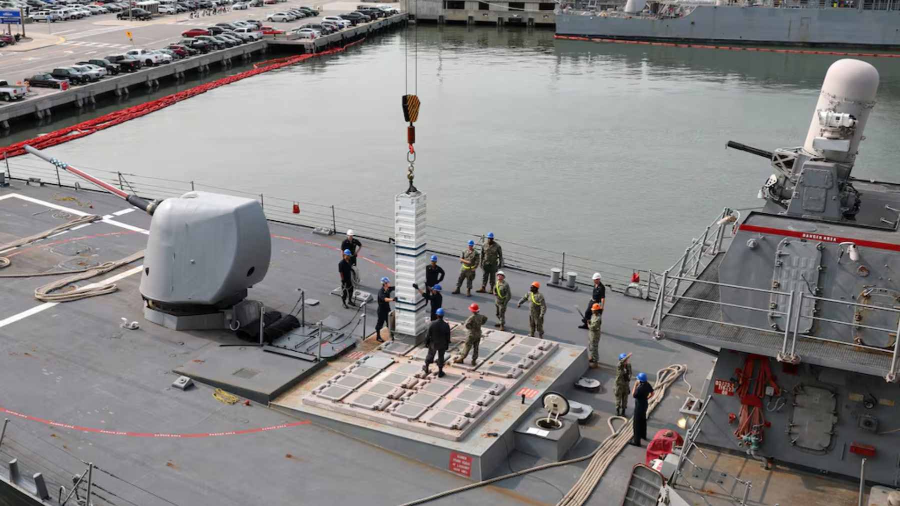A U.S. Navy Arleigh Burke-class destroyer launching a missile from its Mk 41 Vertical Launch System.