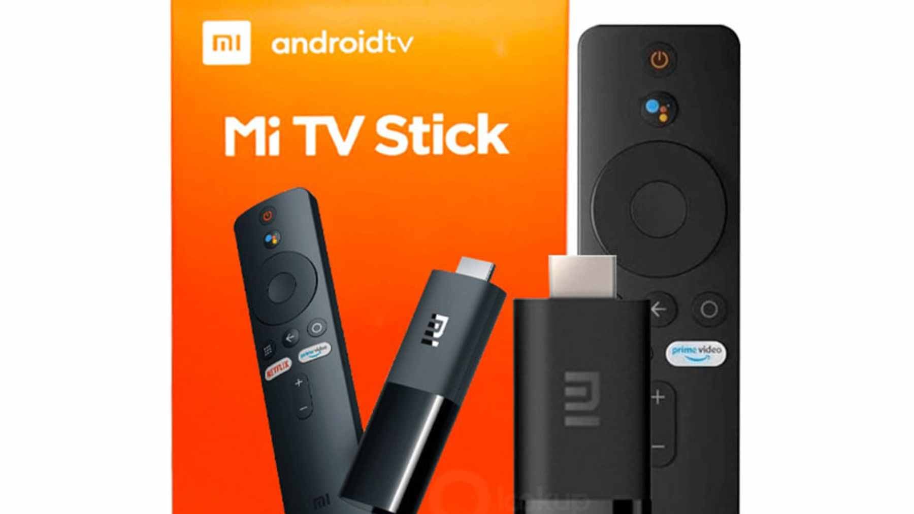 A close-up of the Xiaomi TV Stick HD plugged into the back of an older flat-screen television.