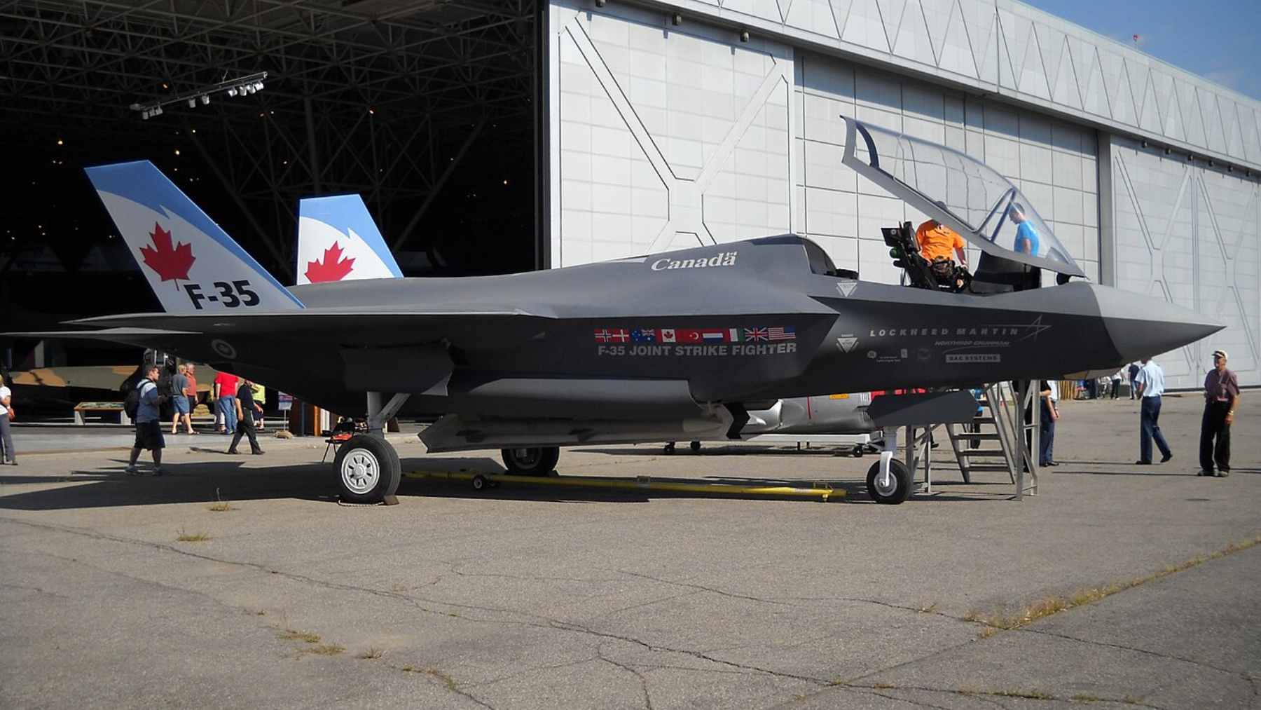 A Lockheed Martin F-35 Lightning II stealth fighter jet performing a maneuver during an aerial demonstration.