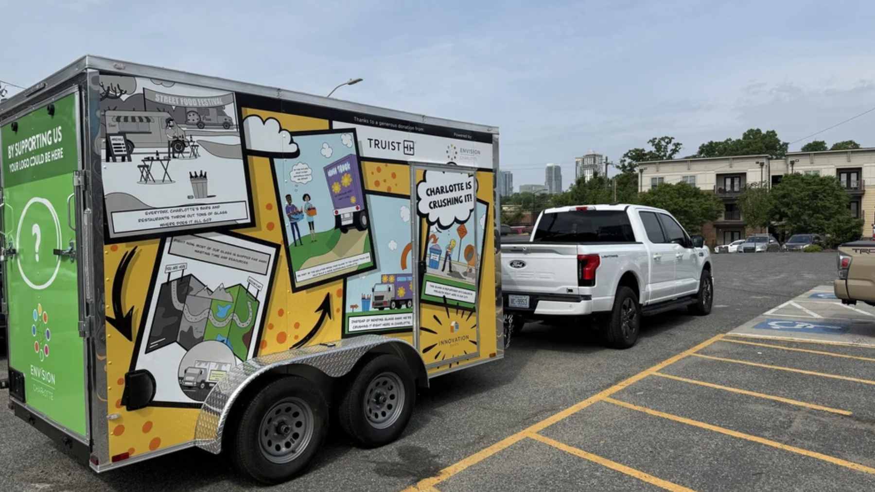 An empty beer bottle becomes sand inside a solar truck, then returns as concrete without leaving the city 1 The solar-powered Crush Truck trailer in Charlotte, North Carolina, processing empty glass bottles into fine, sand-like construction material.