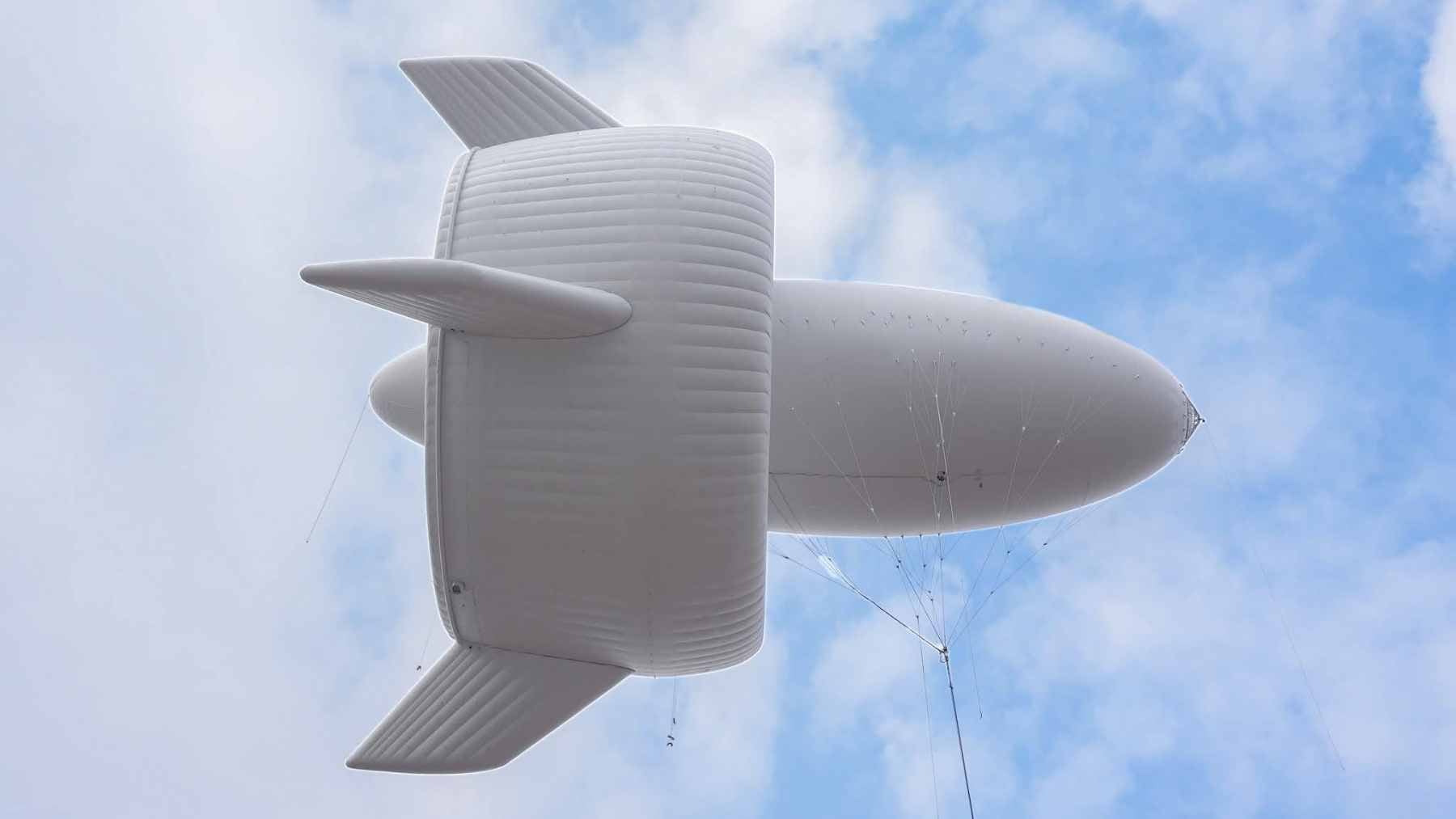 The S2000 Stratosphere Airborne Wind Energy System, a massive blimp-like flying wind turbine, hovering high above the ground.