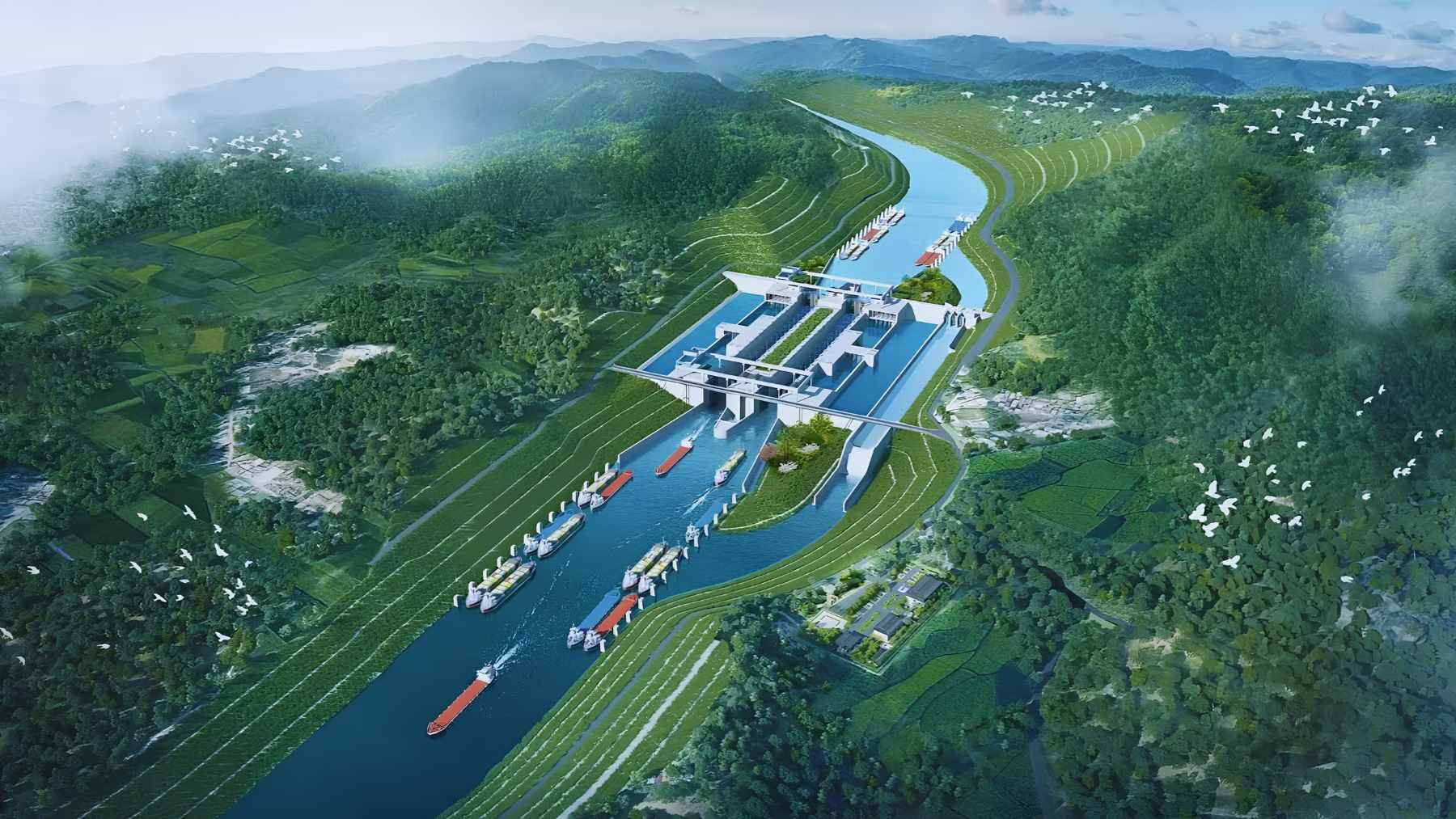 Aerial construction view of the Pinglu Canal showing the lock system and inland waterway integration near the Beibu Gulf.