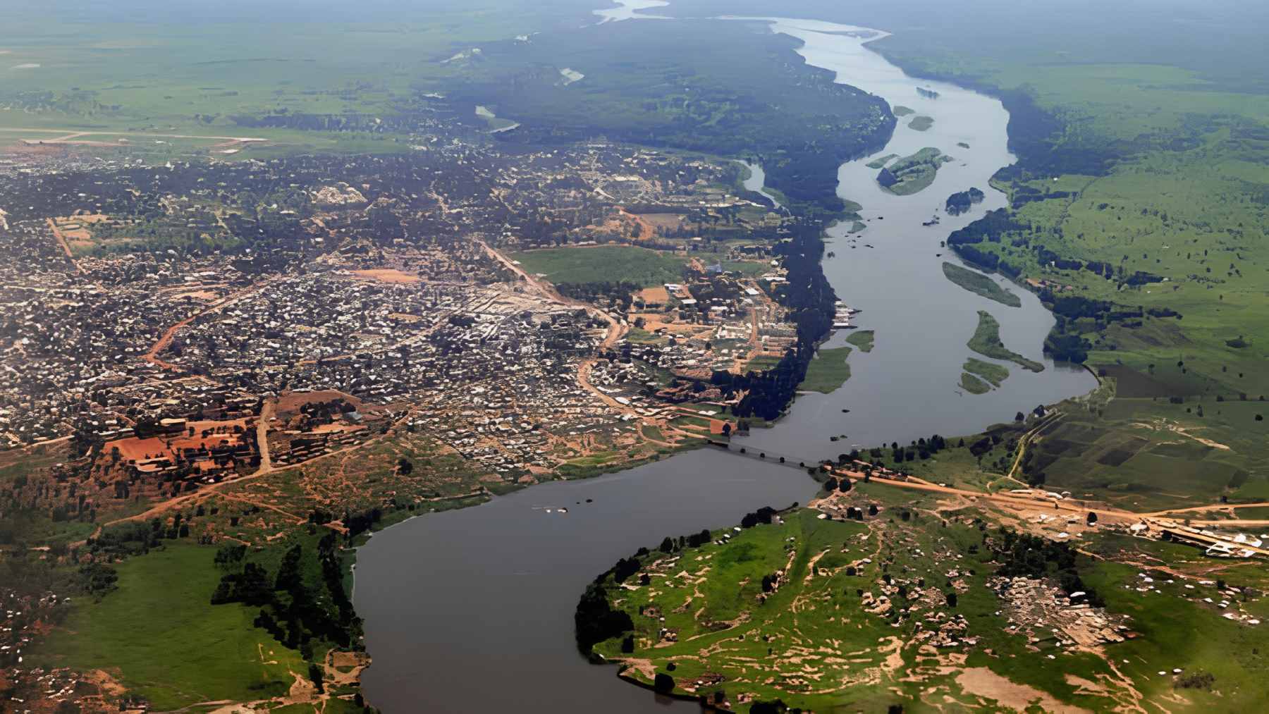 Large-scale water pumping station located along the banks of the Nile River in Egypt.