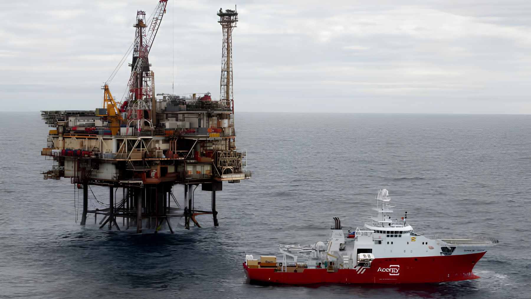 An offshore oil rig platform in the North Sea undergoing decommissioning procedures.