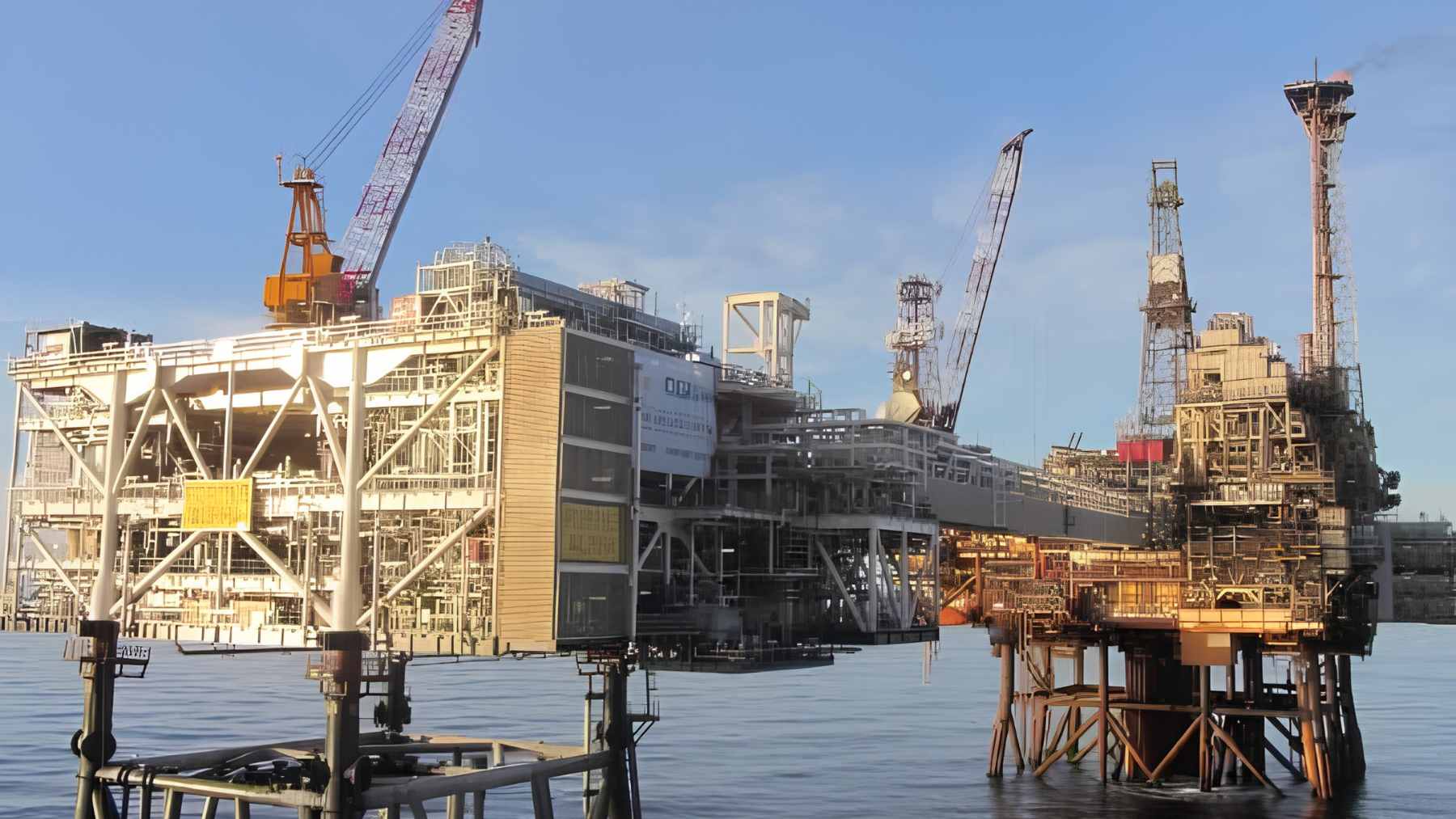 An offshore oil rig platform in the North Sea undergoing decommissioning procedures.