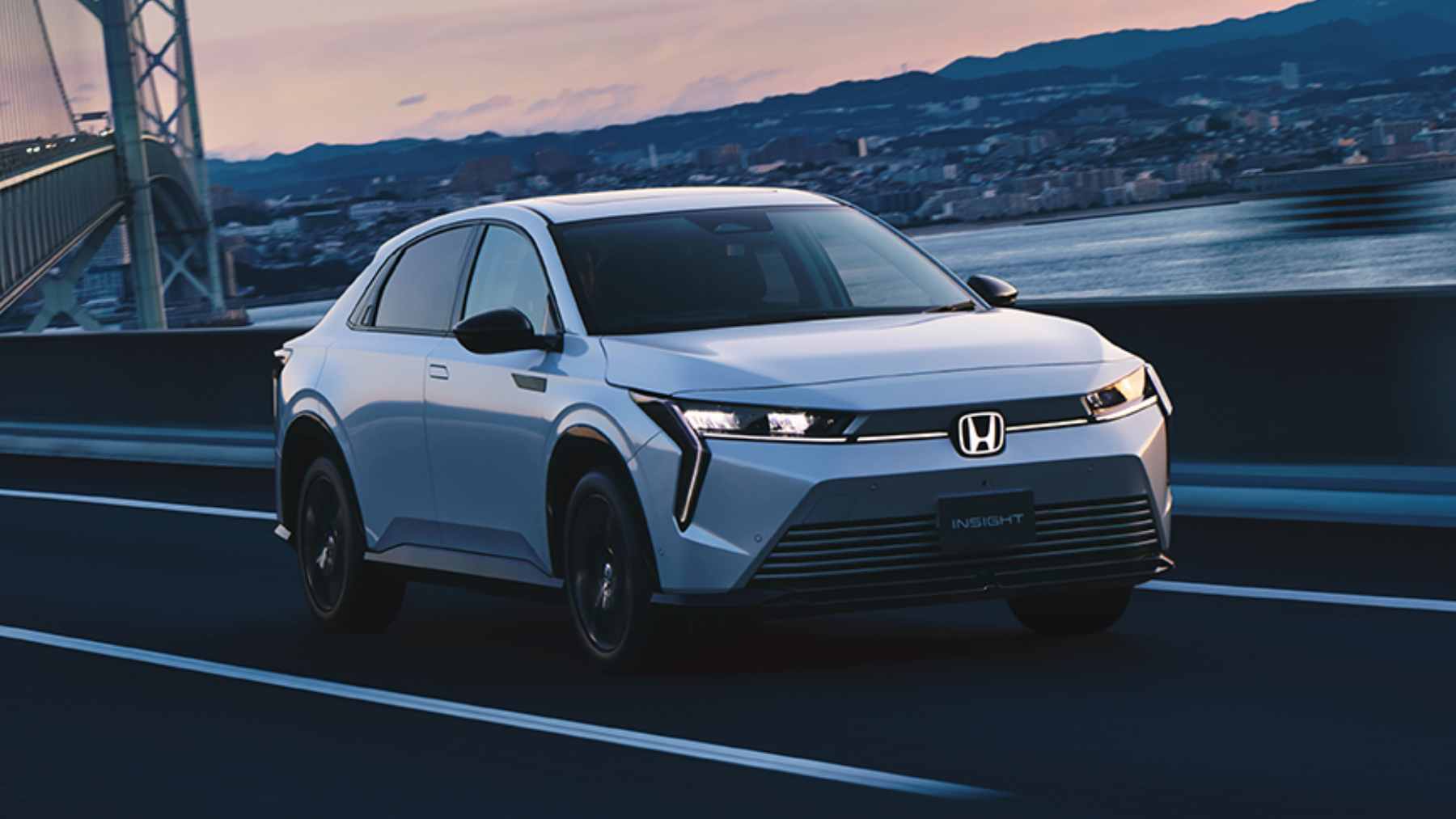 Honda CEO Toshihiro Mibe addressing the media regarding the company’s new strategic focus on hybrid vehicle development.