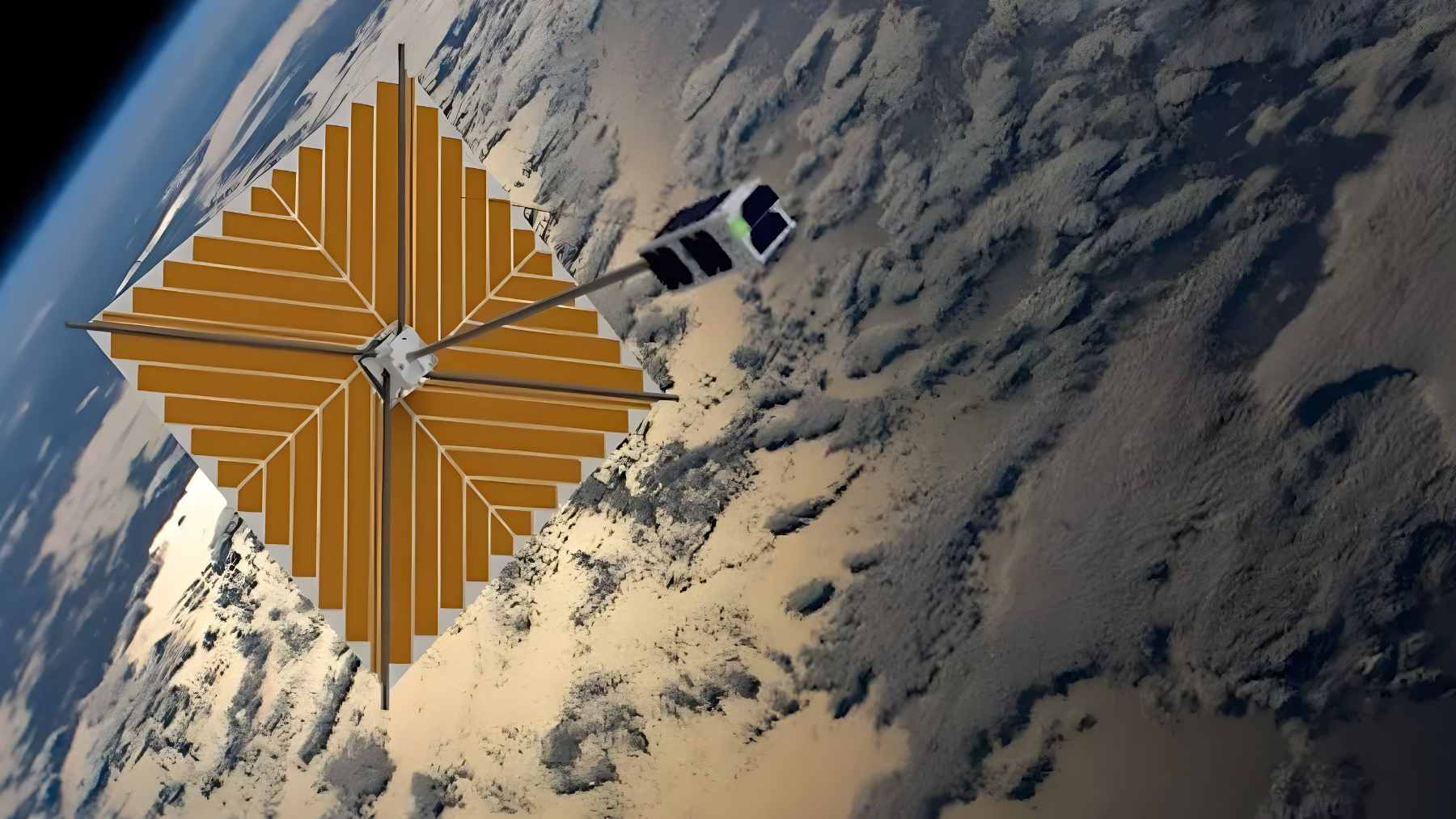 A small, coffee-mug-sized CubeSat deploying its massive, origami-inspired fold-out membrane antenna in low-Earth orbit.