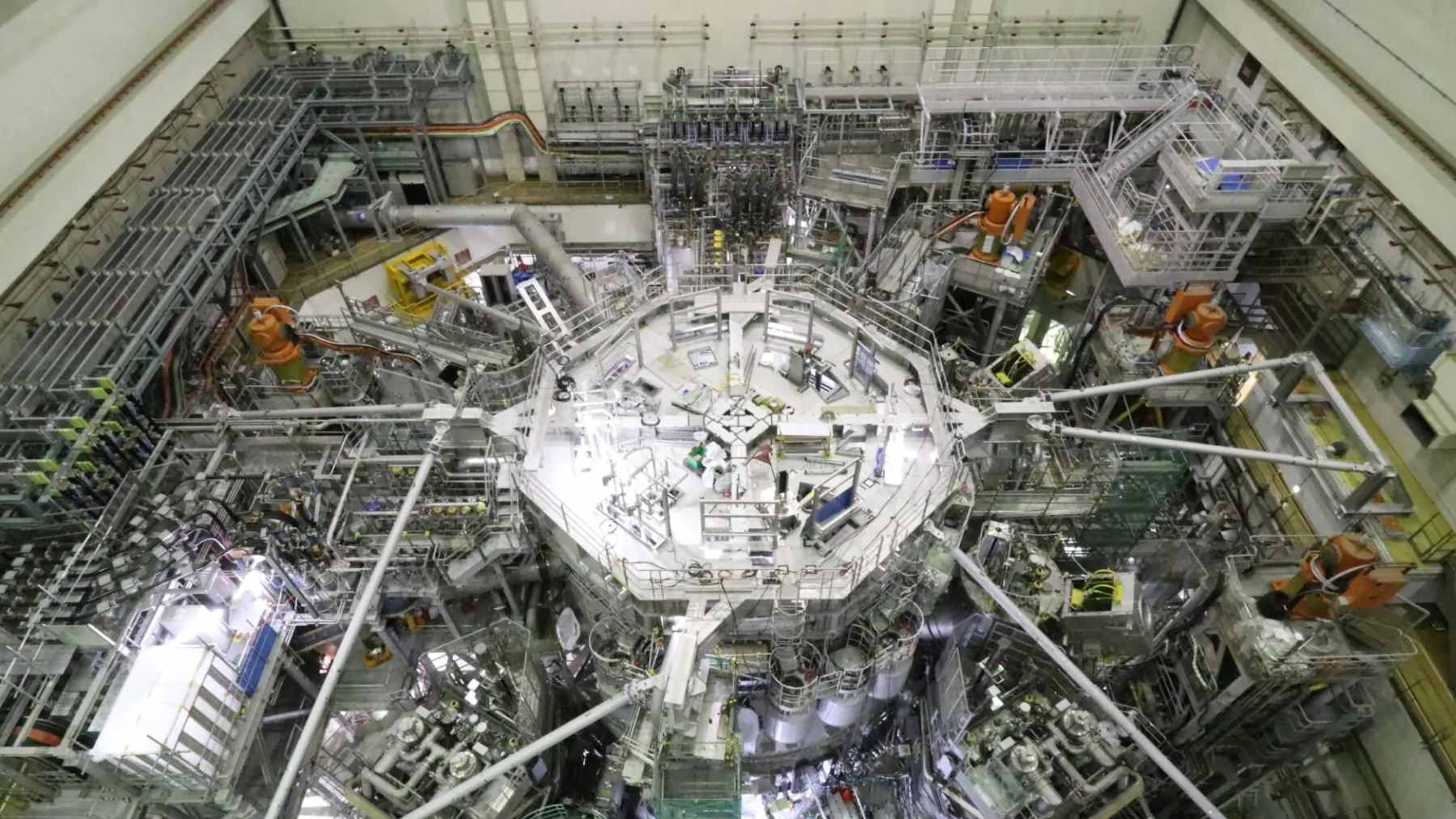 View from above the JT-60SA tokamak during integrated commissioning, showing the newly installed 8-meter in-vessel coils.