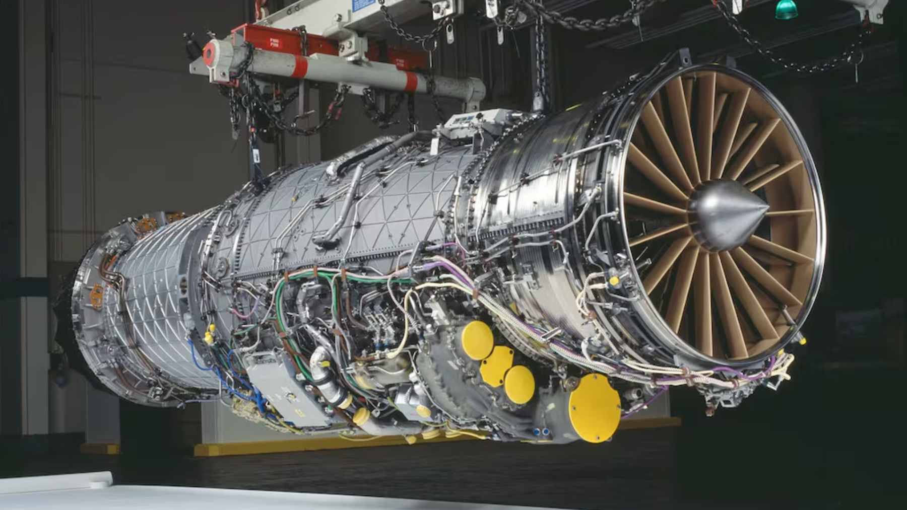 A high-tech F-35 Lightning II jet on a tarmac, representing the massive sustainment and propulsion contracts awarded to Lockheed Martin and RTX.