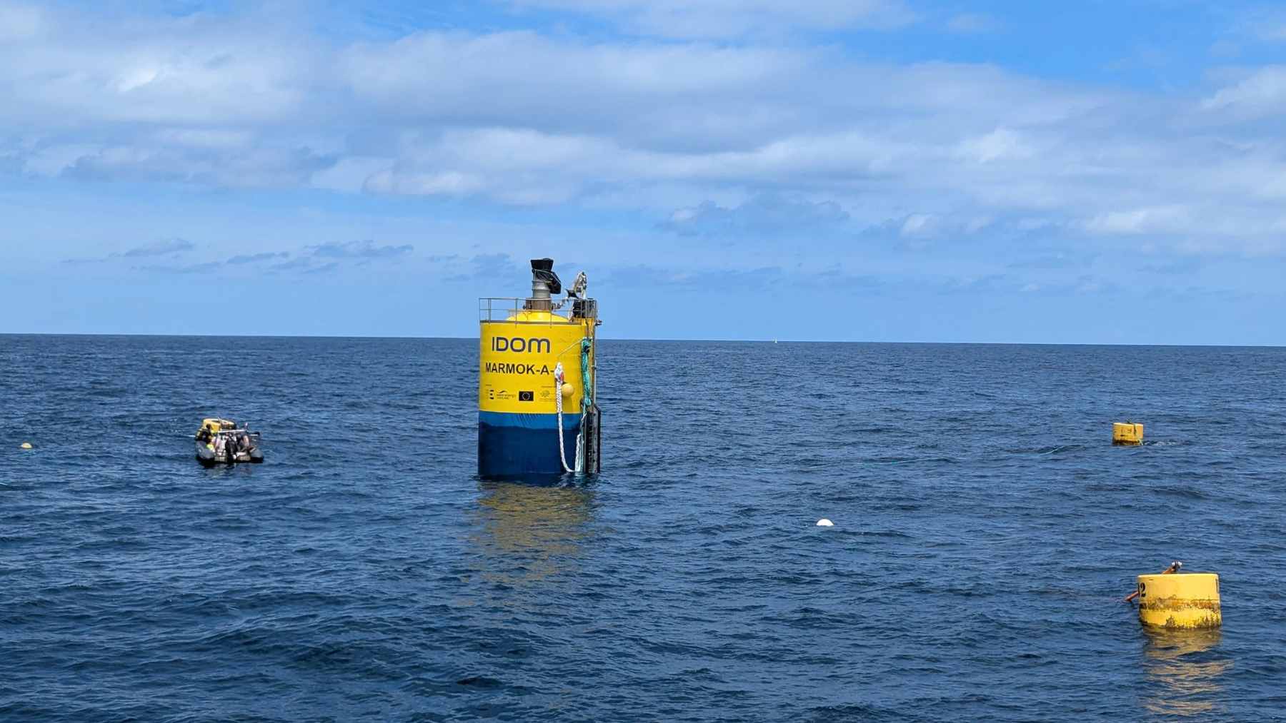 The 42-meter MARMOK-A-5 wave energy converter floating in the Atlantic Ocean off the coast of Bizkaia, Spain.
