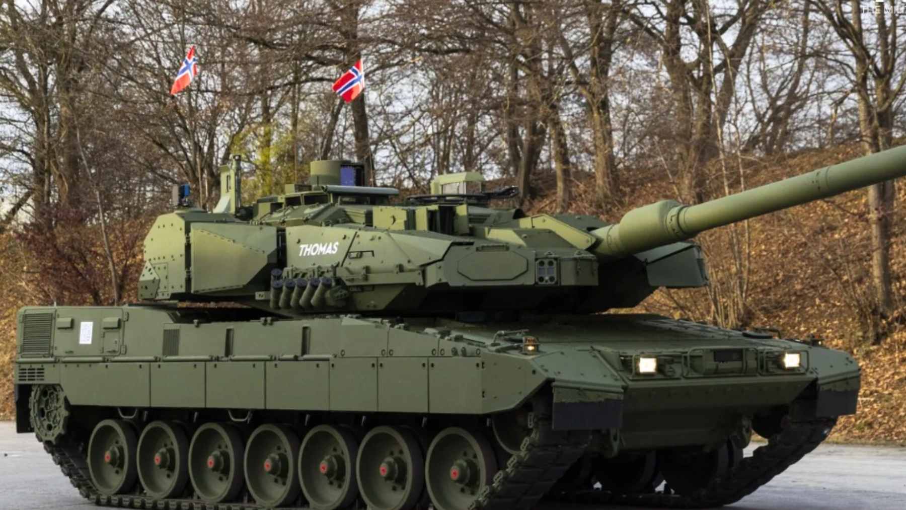 The new Norwegian Leopard 2A8 NO main battle tank during its unveiling at Rena camp, featuring advanced digital sensors and modular armor.