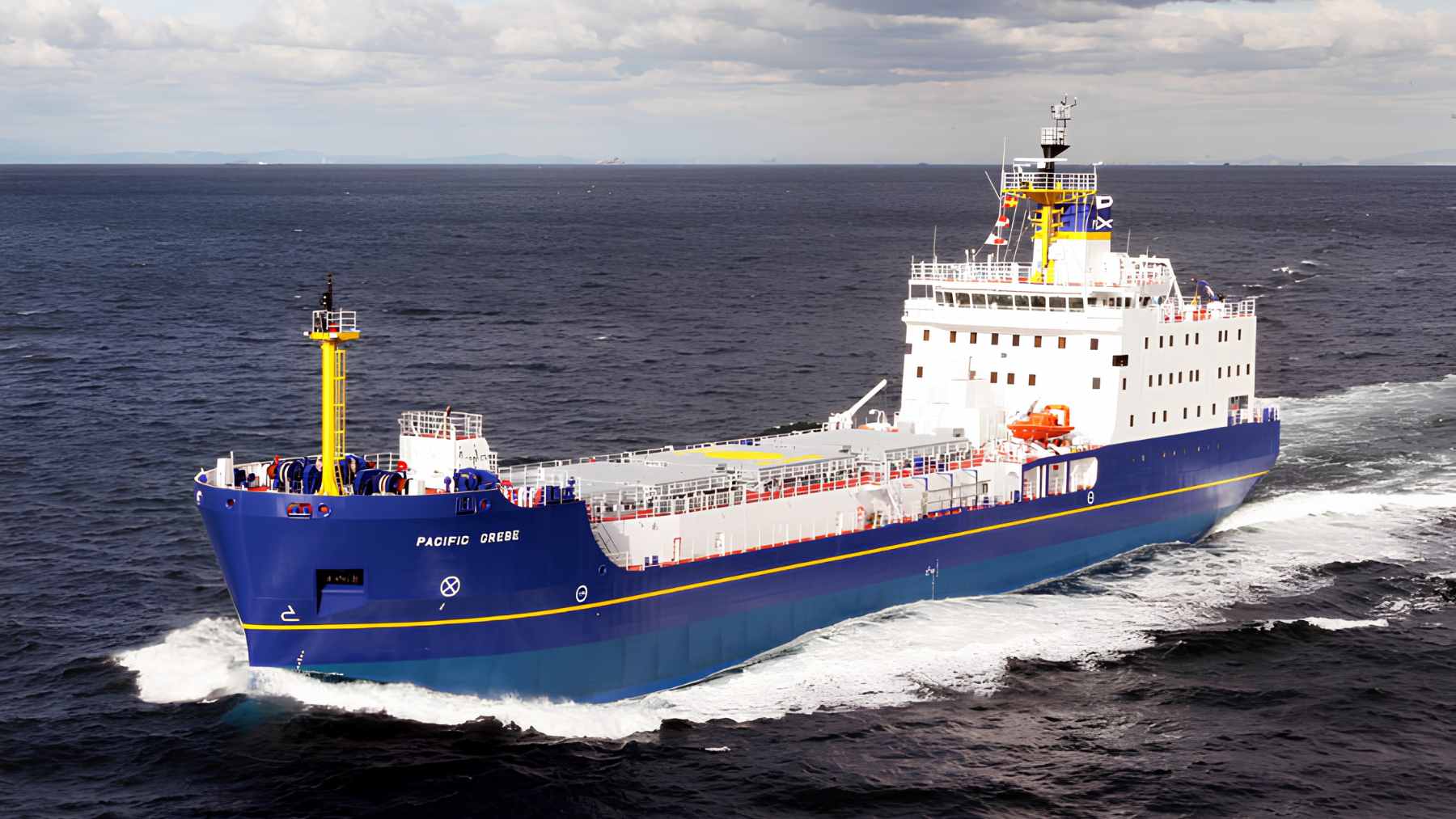 The Pacific Grebe vessel docked at a marine terminal during the test fitting of the massive 150-ton TN Eagle nuclear fuel container.