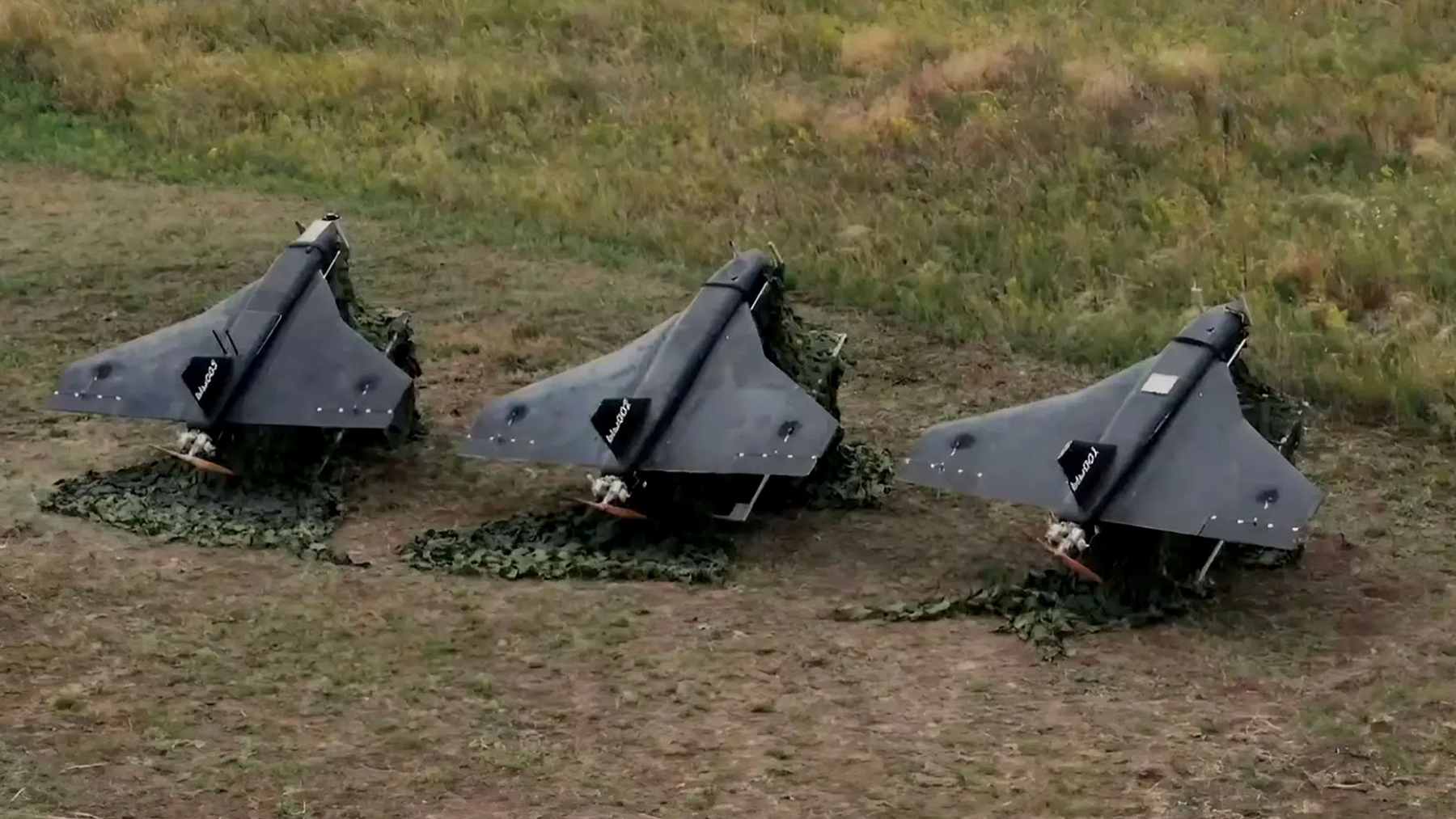 Russian soldiers being trained in the operation of FPV drones and unmanned aerial vehicles at a military center.